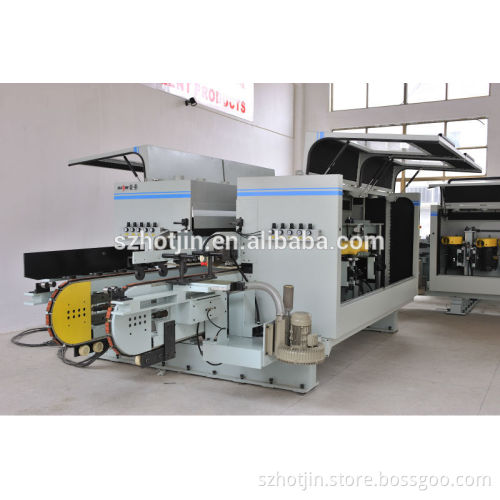 Longitudinal two-track double end tenoner